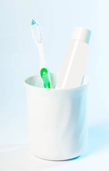 Toothbrushes Glass Table Light Background — Stock Photo, Image