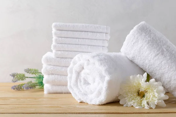 towels roll with flower