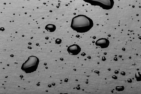 Gotas Agua Salpicaduras Suelo Negro Vista Cerca — Foto de Stock