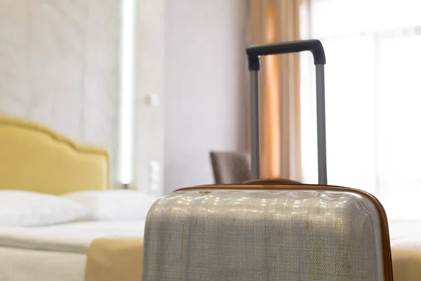 Suitcase or luggage bag in a modern hotel room