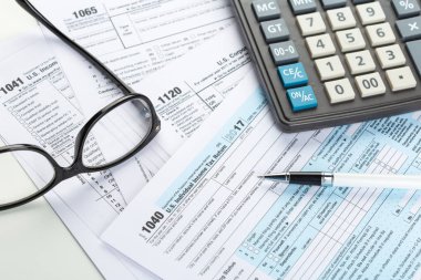 close up of tax forms as background clipart