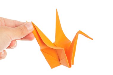 Origami kraan op witte achtergrond