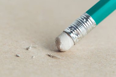 Pencil for writing and eraser, close up view clipart