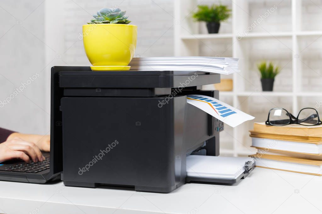 printer in office on background,close up