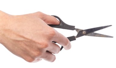 Makas, beyaz arka plan üzerinde izole tutmak el
