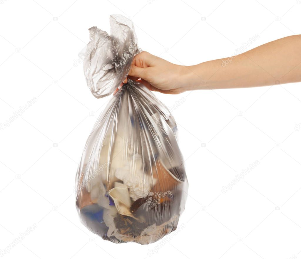 woman hands holding garbage bag isolated on white background