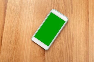 ahşap masa telefonu beyaz ekran