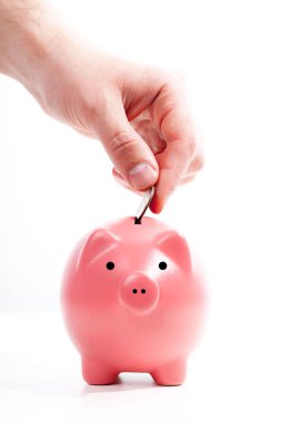 tasarruf - kumbara ve madeni para ile el