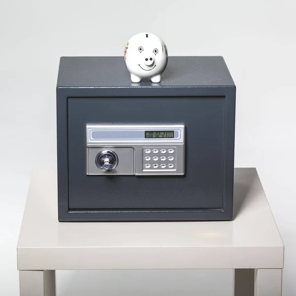 Piggy bank in safe