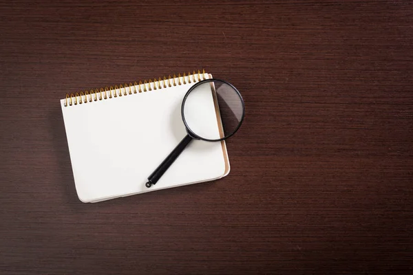 Notebook Magnifier Wooden Background — Stock Photo, Image