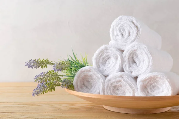 towels roll with flower