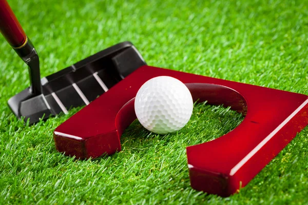 Mini golf equipment on green grass