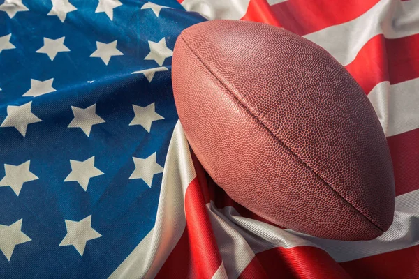 American football on American old glory flag