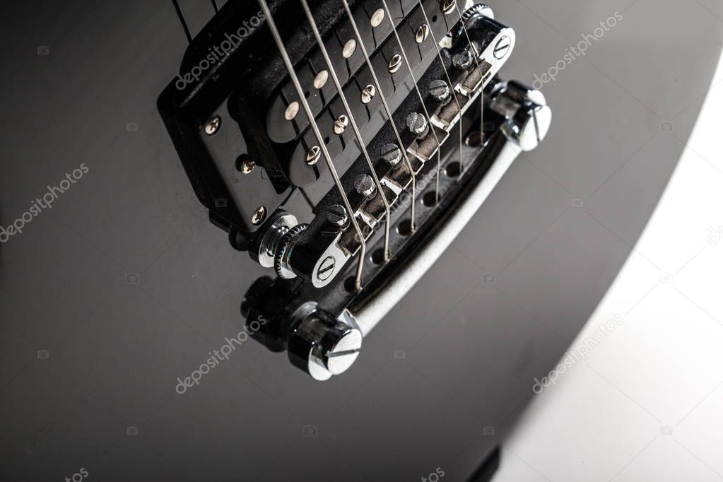 Electric guitar parts on background,close up