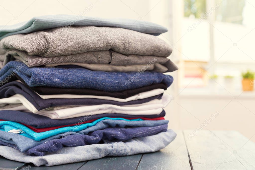 Stack of  clothes on background,close up