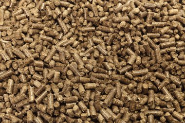 Textured background of wooden pellets. clipart