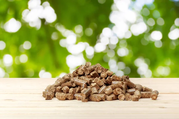 Bolitas Madera Sobre Fondo Verde Biocombustibles —  Fotos de Stock