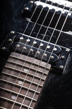Elektro gitar parçaları üzerinde arka plan, yakın çekim
