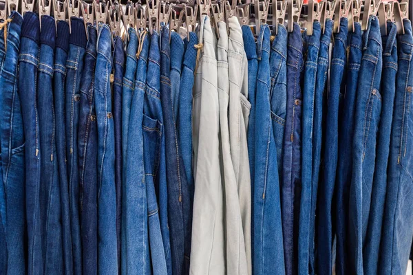 Clothes on rail in clothing store