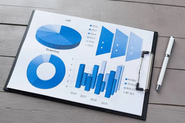 Cuadros Papel Financiero Gráficos Sobre Mesa —  Fotos de Stock