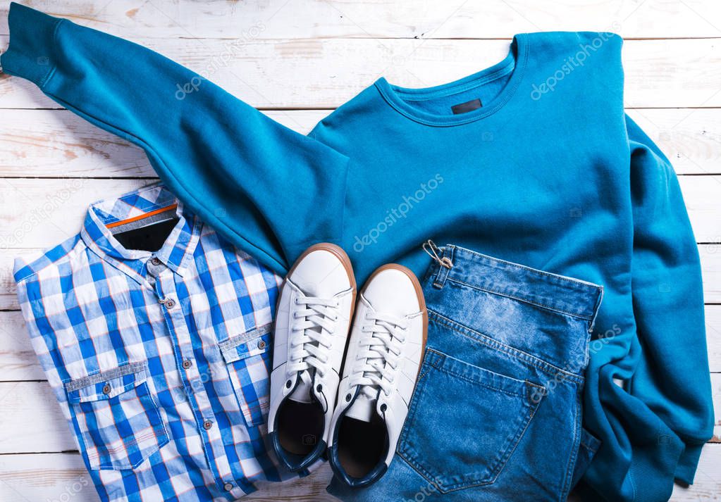 cool fashion casual men outfit on wooden table