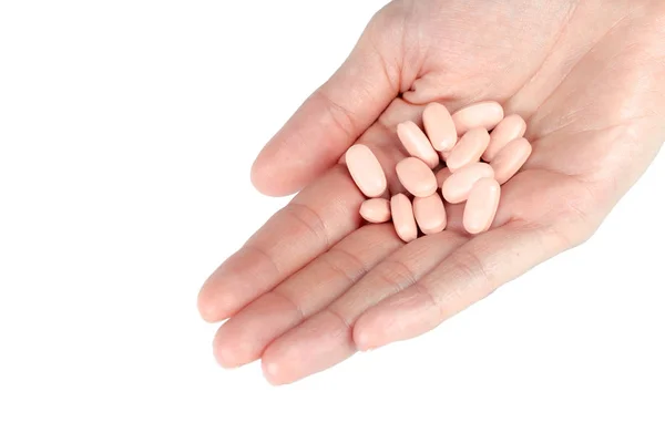 Femmes Mains Tenant Des Pilules Isolées Sur Fond Blanc Gros — Photo