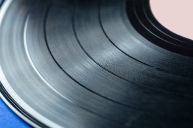 Retro vinil kayıt üzerinde mavi arka plan