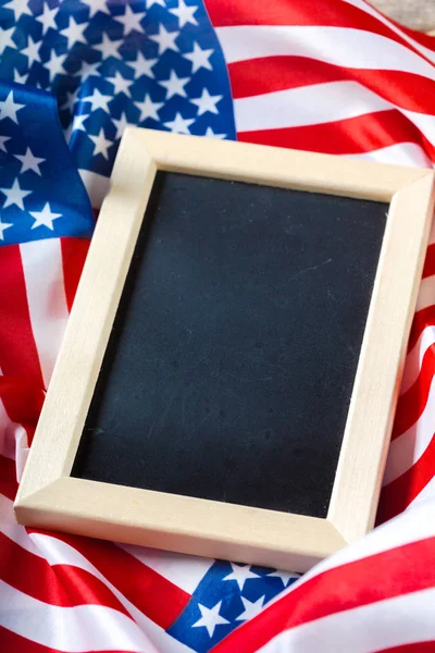 Blank chalk board with American Flag