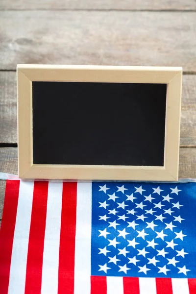 Blank chalk board with American Flag