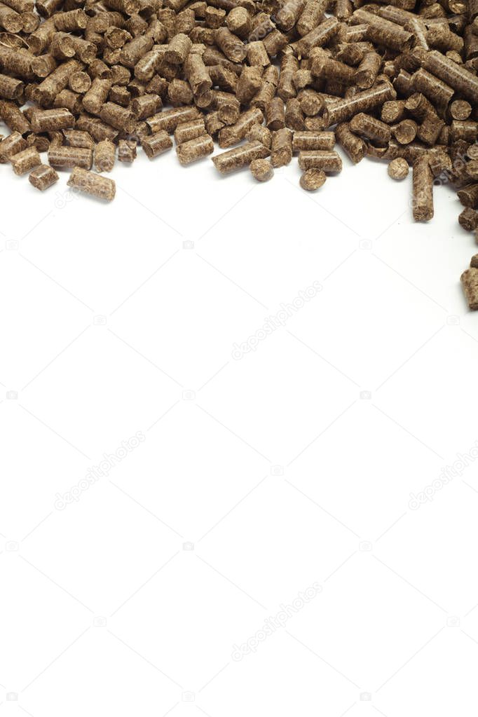 stack of wooden pellets for bio energy, white background, isolated