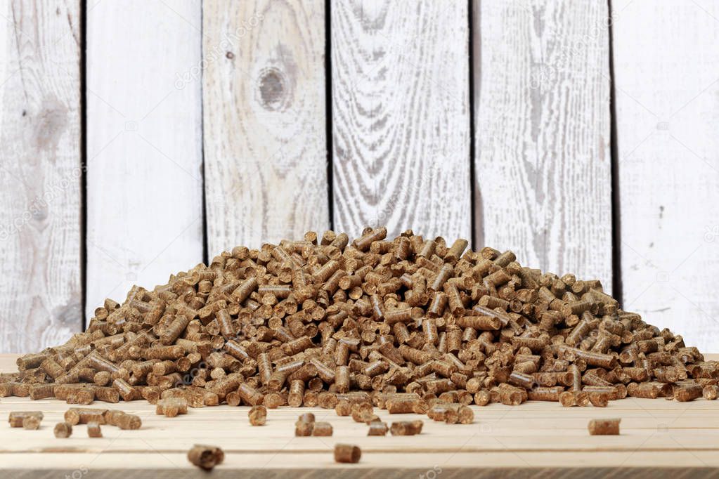 wooden pellets on wooden table 