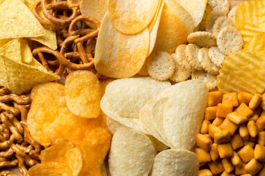 Salty snacks. Pretzels, chips, crackers clipart
