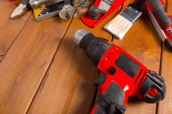 Verschiedene Arbeitswerkzeuge Auf Holz Hintergrund — Stockfoto