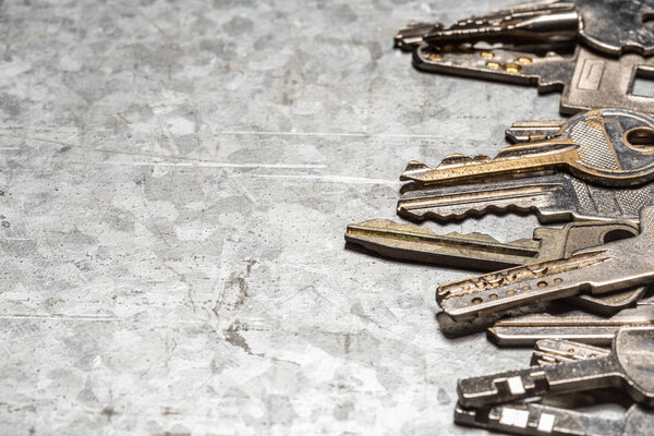 Old keys on grey background