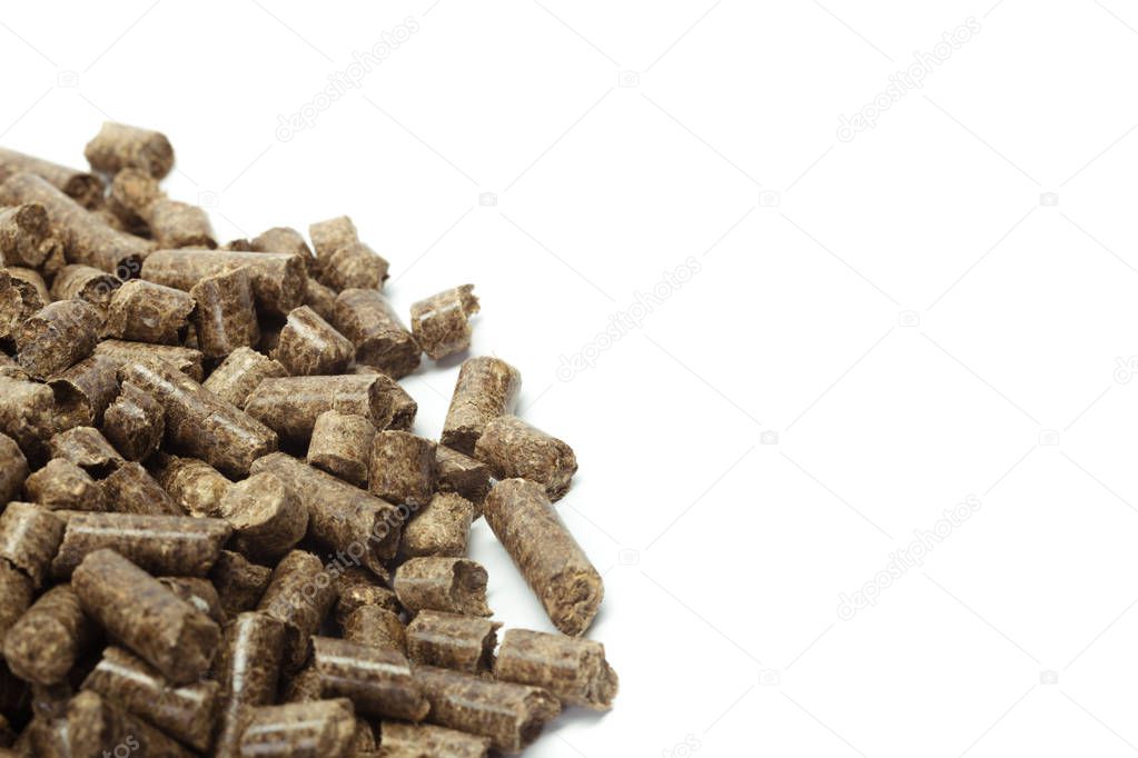 stack of wooden pellets for bio energy, white background, isolated