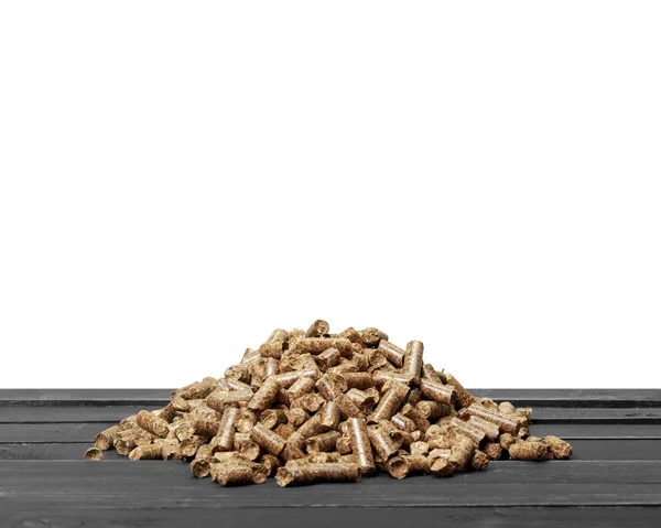 Holzpellets Auf Holztisch — Stockfoto