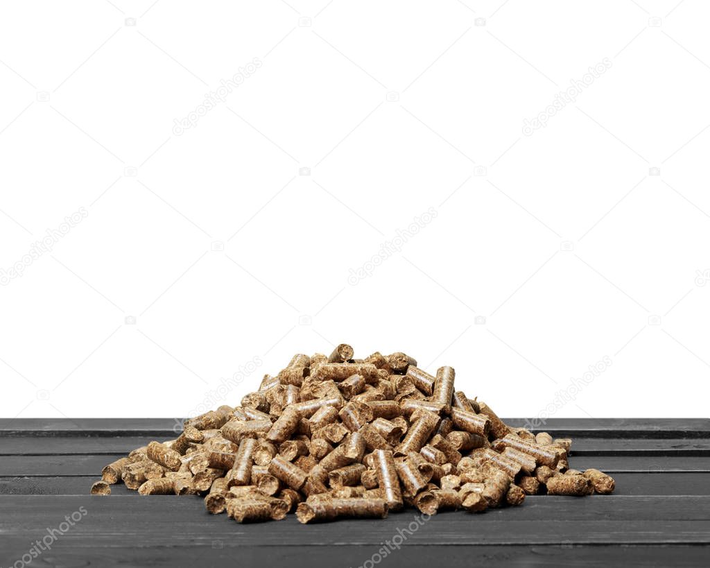 wooden pellets on wooden table 