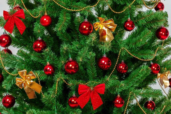 Christmas tree with ornaments, close-up