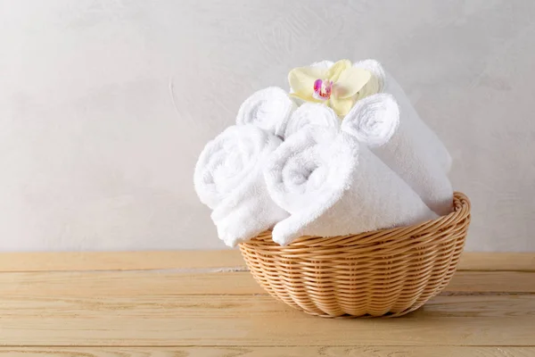 towels rolls with flower, close-up view