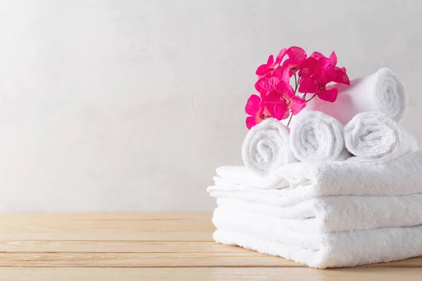 towels roll with flower, close-up view