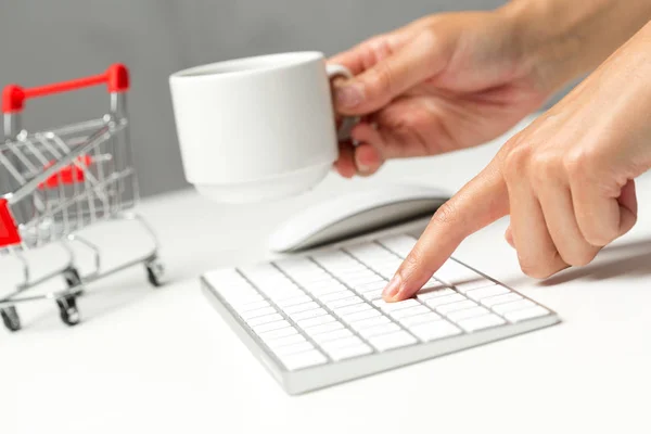 person Online shopping with computer keyboard