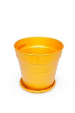 Beyaz arka plan üzerinde izole boş Saksının dibine yakın çekim  