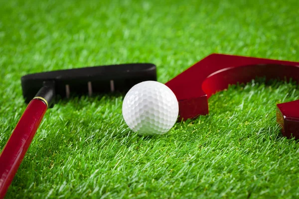 Mini golf equipment on green grass