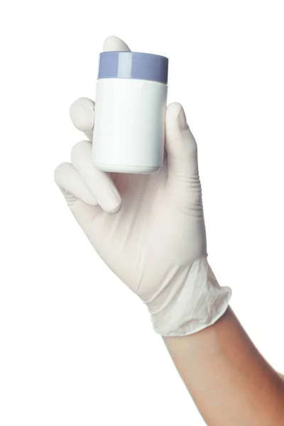 医師が薬を持って白滅菌外科手袋の手します — ストック写真