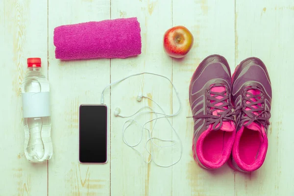 elevated view of sport stuff on wooden table