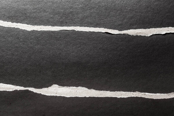 Абстрактный черный рваный бумажный фон
