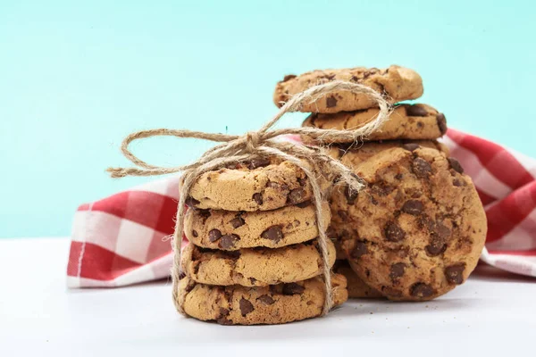 chocolate chunk cookies on a bright blue background