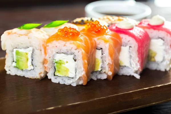 front view of rainbow maki sushi