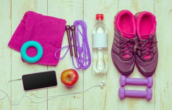 elevated view of sport stuff on wooden table