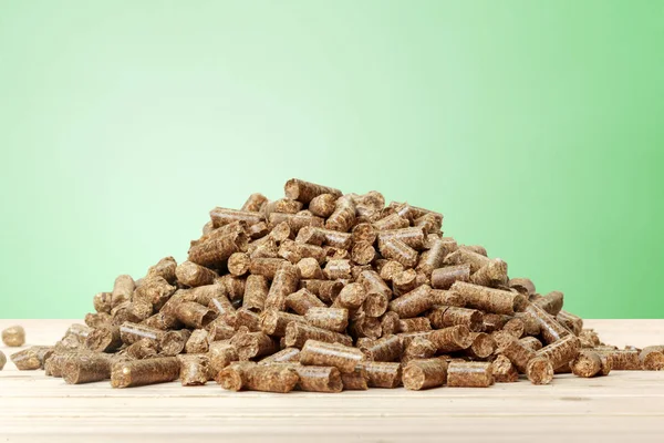 Bolitas Madera Sobre Fondo Verde Biocombustibles —  Fotos de Stock